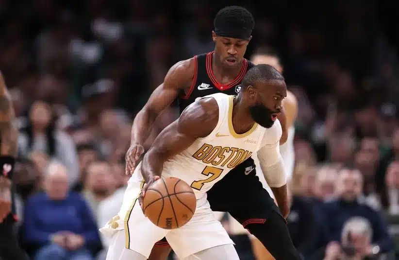 Boston Celtics forward Jaylen Brown (7) dribbles down the court