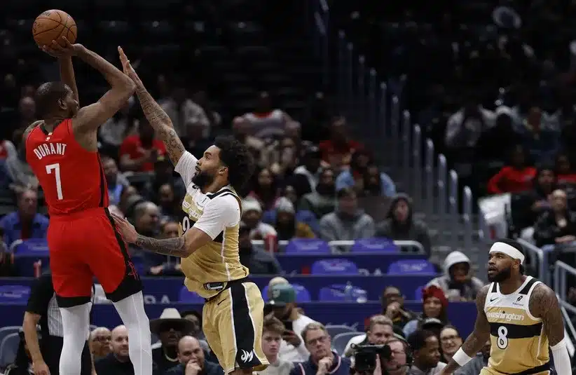 Houston Rockets forward Kevin Durant (7) shoots the ball