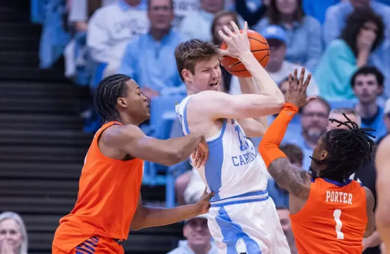 North Carolina Tar Heels center Henri Veesaar (13) gets doubled
