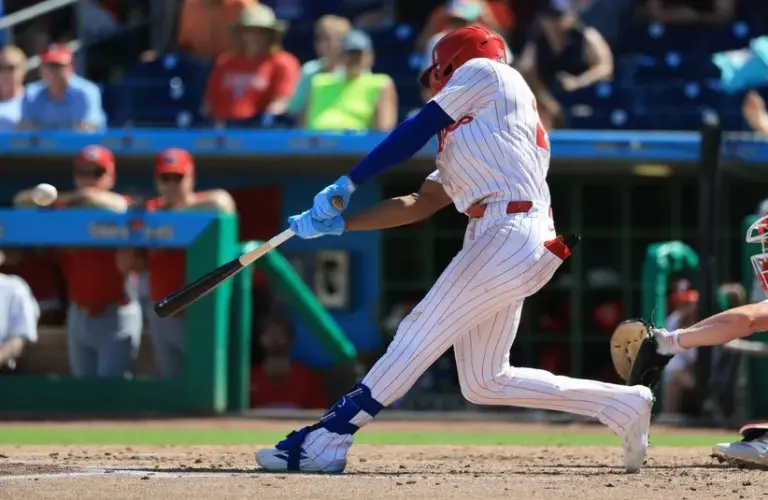 Philadelphia Phillies center fielder Johan Rojas (23) singles during the fourth inning