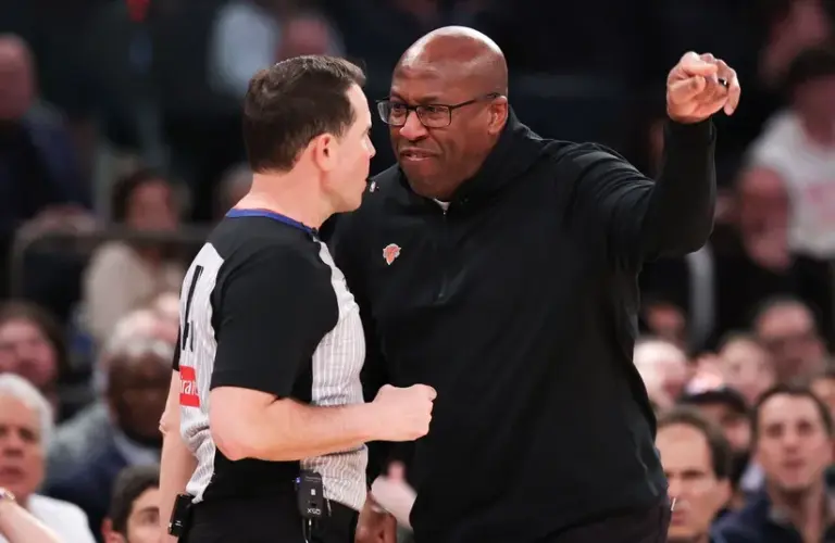New York Knicks head coach Mike Brown argues with referee Brian Forte (45)