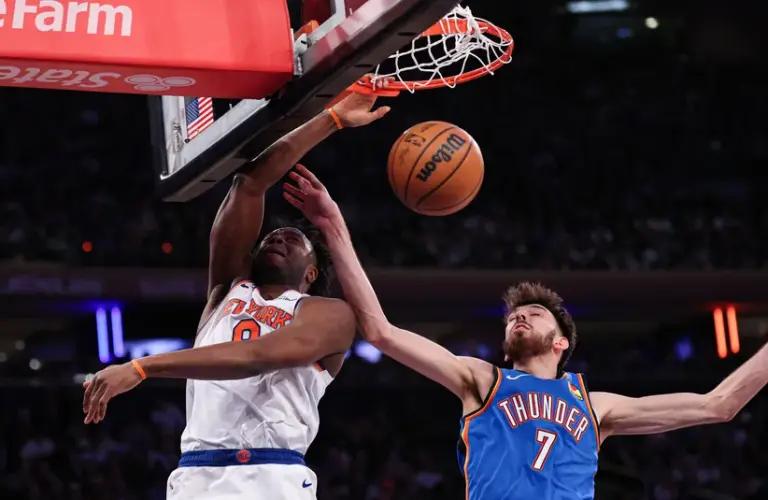 New York Knicks forward OG Anunoby goes up for a dunk against Oklahoma City Thunder center Chet Holmgren during the second half of a NBA Game