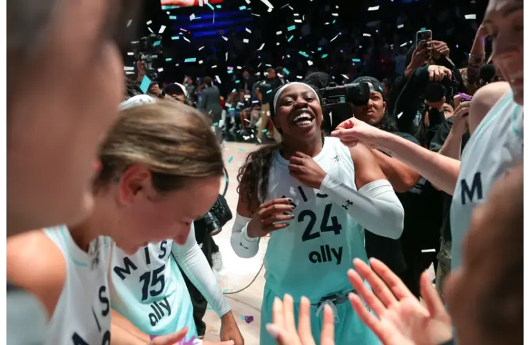 Arike Ogunbowale Celebrates with the rest of her Mist teammates after winning the Unrivaled title.
