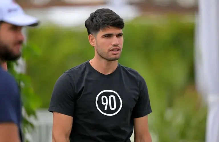 Carlos Alcaraz (ESP) warms up before hitting on the practice courts