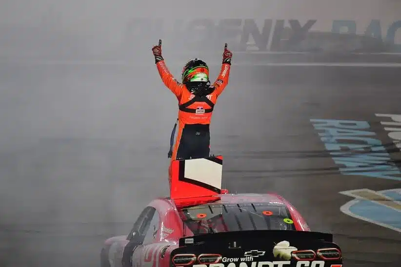 Mar 7, 2026; Avondale, Arizona, USA; JR Motorsports driver Justin Allgaier (7) celebrates his victory of the the GOVX 200 at Phoenix Raceway.