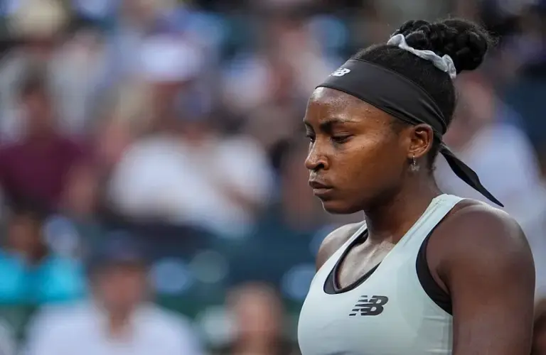 Coco Gauff reacts to a game lost during her first set