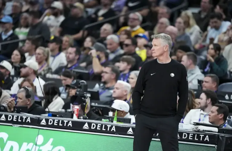 Golden State Warriors head coach Steve Kerr looks down the court