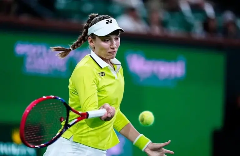 Rybakina hitting a forehand