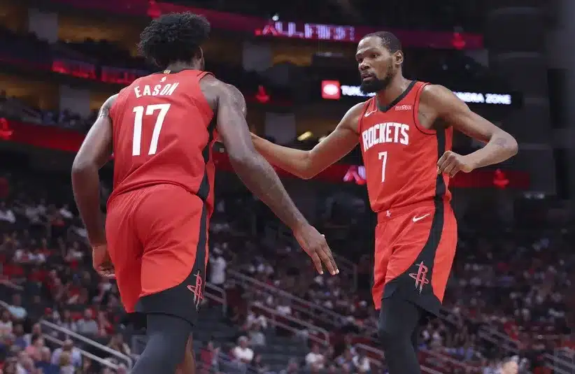 Houston Rockets forward Tari Eason (17) celebrates with forward Kevin Durant (7)