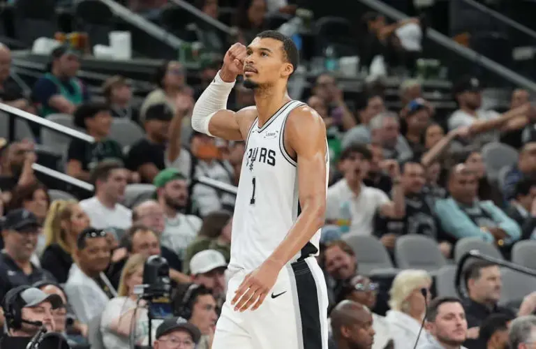 San Antonio Spurs forward Victor Wembanyama (1) walks off the court