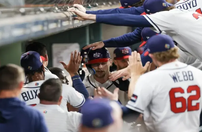 USA shortstop Bobby Witt Jr. (7) hits a home run