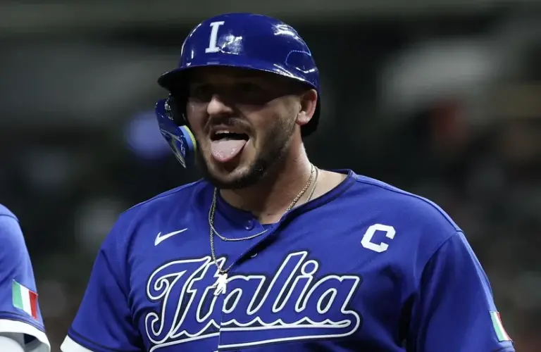 Italy first baseman Vinnie Pasquantino (9) reacts after hitting a home run