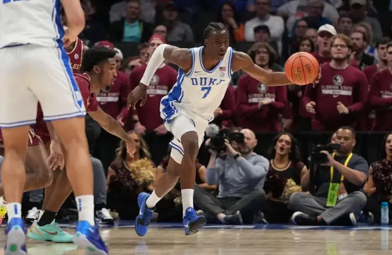 Duke Blue Devils guard Dame Sarr (7) with the ball