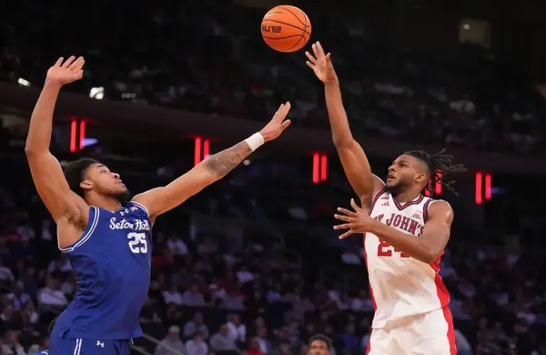St. John's Red Storm forward Zuby Ejiofor (24) shoots