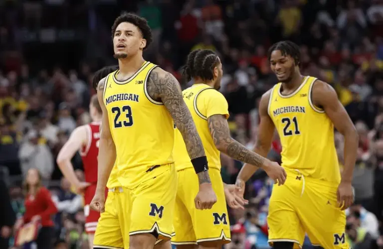 Michigan Wolverines forward Yaxel Lendeborg (23) reacts after scoring