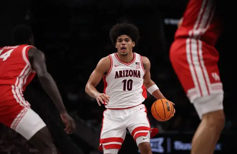 Arizona Wildcats forward Koa Peat (10) dribbles downcourt