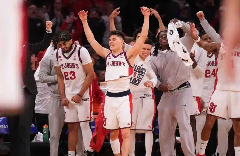 The St. John's Red Storm bench celebrates winning the men's Big East Conference Tournament Championship