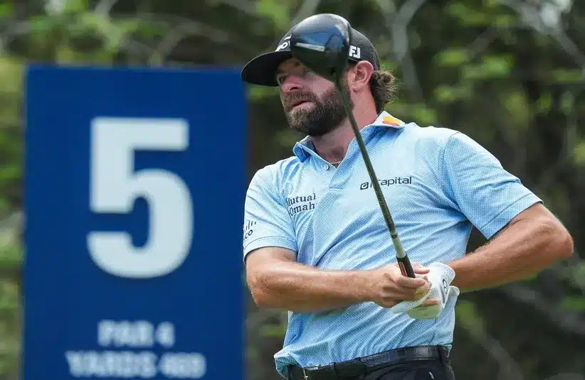 Cameron Young watches his tee shot off on the fifth hole during the final round of The Players Championship