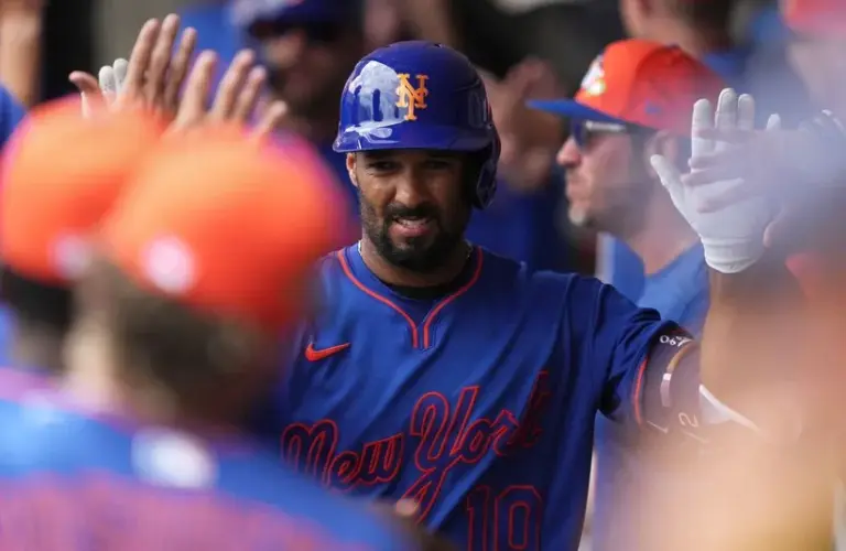 New York Mets second baseman Marcus Semien (10) celebrates