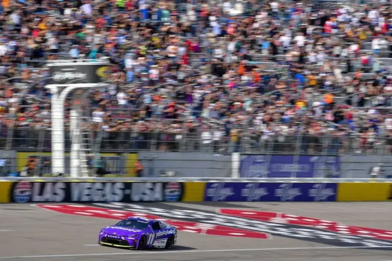 Mar 15, 2026; Las Vegas, Nevada, USA; Joe Gibbs Racing driver Denny Hamlin (11) crosses the line to win the Pennzoil 400 at Las Vegas Motor Speedway.