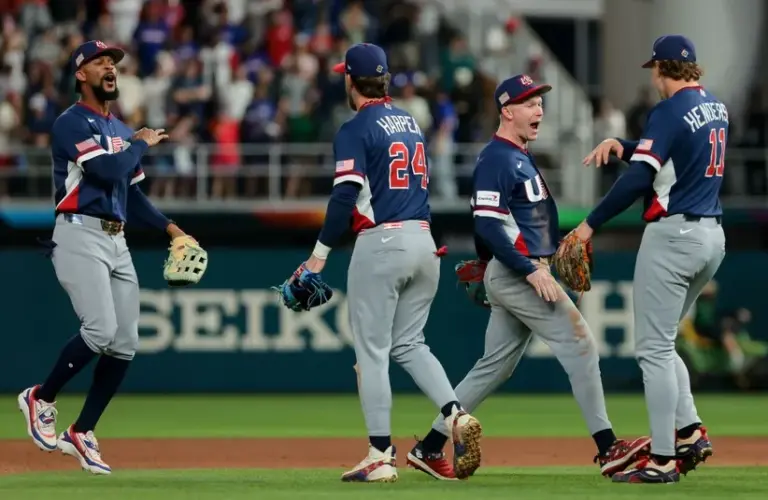 United States center fielder Byron Buxton (25), first baseman Bryce Harper (24), center fielder Pete Crow-Armstrong (4) and pitcher Mason Miller (19) celebrate after defeating the Dominican Republic