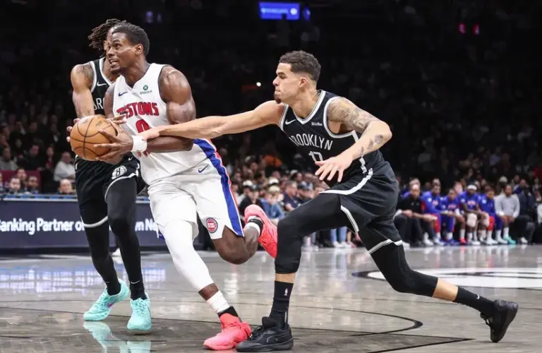 Detroit Pistons center Jalen Duren (0) and Brooklyn Nets forward Michael Porter Jr. (17)