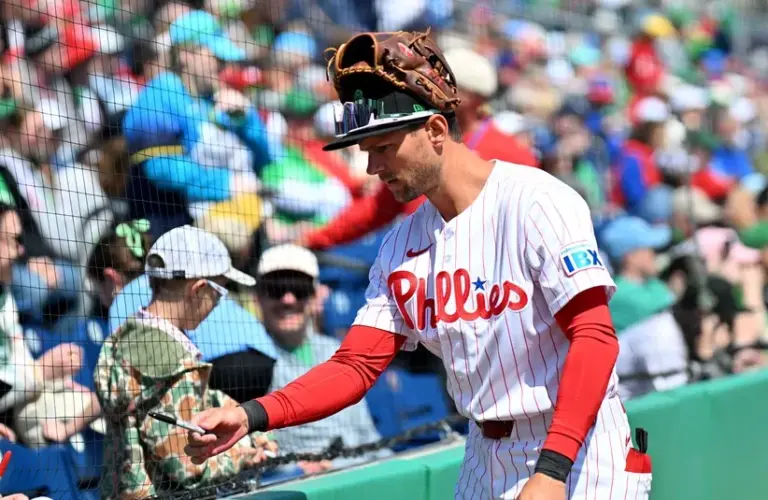 Philadelphia Phillies shortstop Trea Turner (7) signs autographs