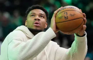 Giannis Antetokounmpo (34) takes shots during a timeout against the Cleveland Cavaliers in the first half at Fiserv Forum. Miami Heat