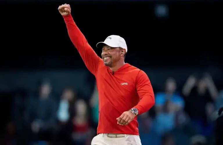 Tiger Woods of Jupiter Links GC celebrates the win over Boston Common