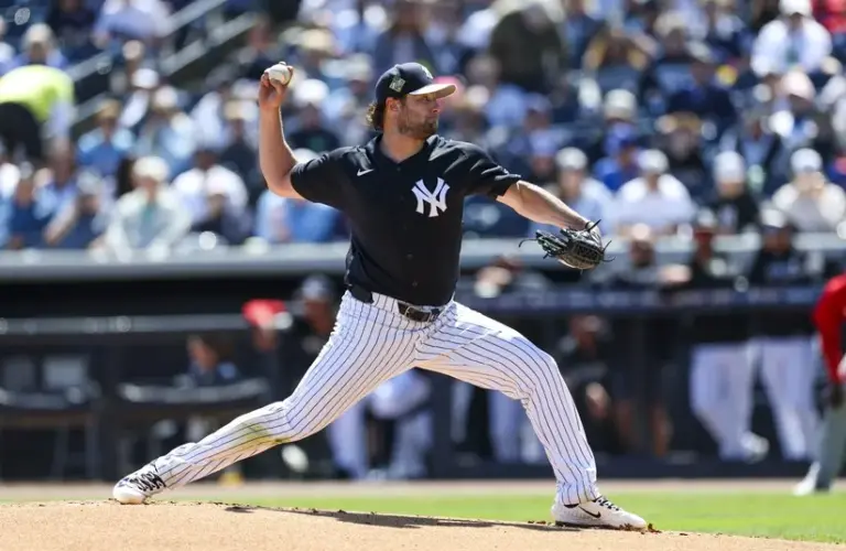New York Yankees pitcher Gerrit Cole (45) throws a pitch against the Boston Red Sox