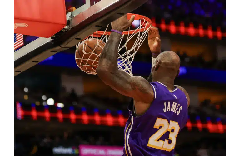 Lebron violently slamming the dunk down