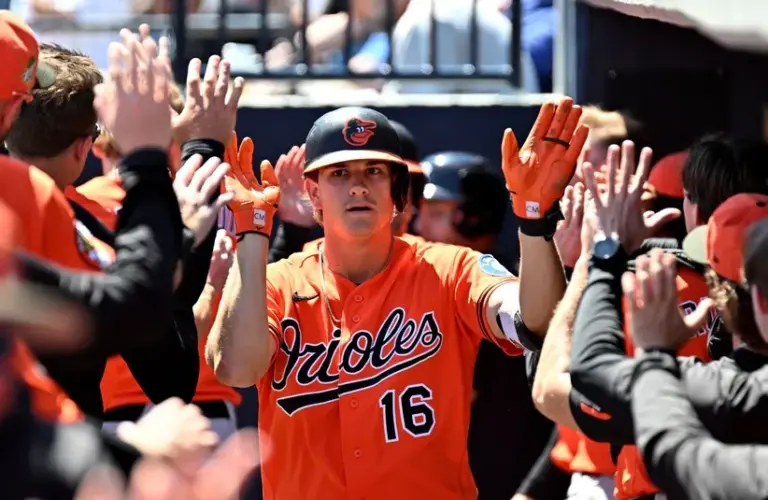 Baltimore Orioles third baseman Coby Mayo (16) celebrates in the dugout after hitting a two-run home run