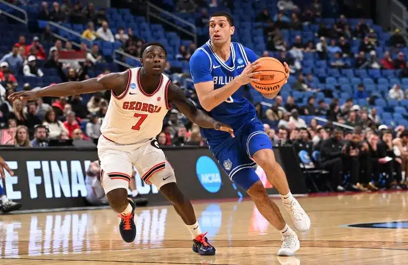 Saint Louis Billikens forward Ishan Sharma (9) drives to the basket