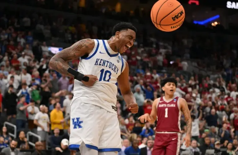 Kentucky Wildcats forward Brandon Garrison (10) reacts after dunking the ball