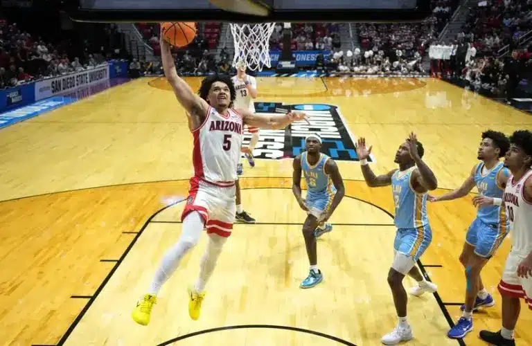 Arizona Wildcats guard Brayden Burries (5) shoots