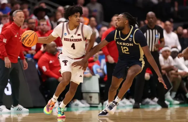 Texas Tech Red Raiders guard Christian Anderson (4) dribbles