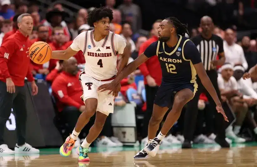 Texas Tech Red Raiders guard Christian Anderson (4) dribbles
