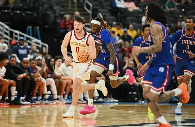 State Cyclones guard Nate Heise (0) brings the ball up court
