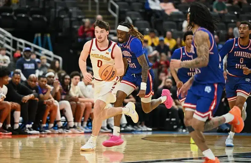 State Cyclones guard Nate Heise (0) brings the ball up court