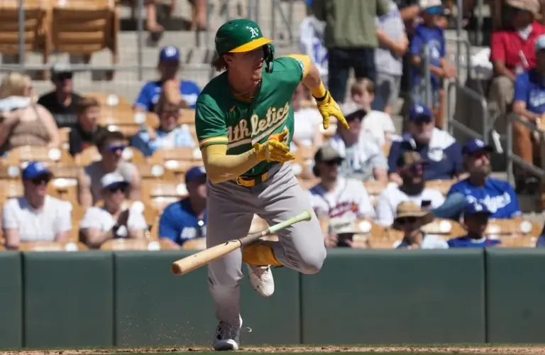 Athletics right fielder Henry Bolte (33) hits against the Los Angeles Dodgers