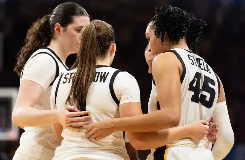 Iowa huddles in NCAA Tournament game against FDU.