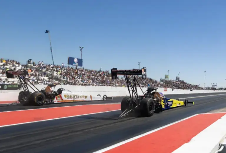 Mar 21, 2026; Chandler, AZ, USA; NHRA top fuel driver Leah Pruett (near) alongside Shawn Langdon during qualifying for the Arizona Nationals at Firebird Motorsports Park.