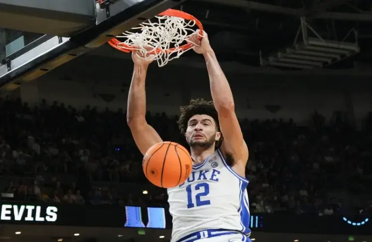 Duke Blue Devils forward Cameron Boozer (12) dunks during the second half of the NCAA Men’s Basketball Tournament