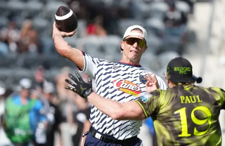 Founders FFC quarterback Tom Brady (12) throws ball against Logan Paul