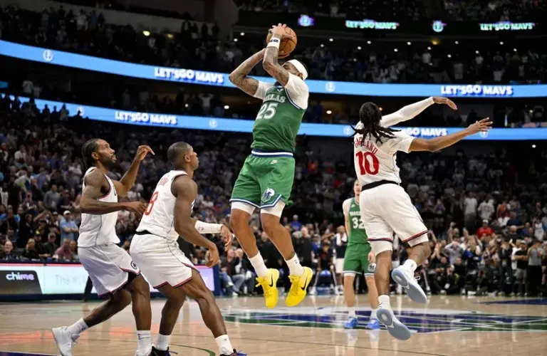 Dallas Mavericks forward P.J. Washington (25) attempts a jump shot