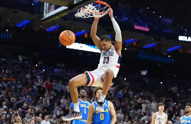 UConn Huskies forward Jayden Ross (23) dunks the ball against the UCLA Bruins in the second half during a second round game of the men's 2026 NCAA Tournament.