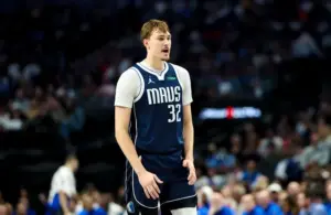 Dallas Mavericks forward Cooper Flagg (32) reacts