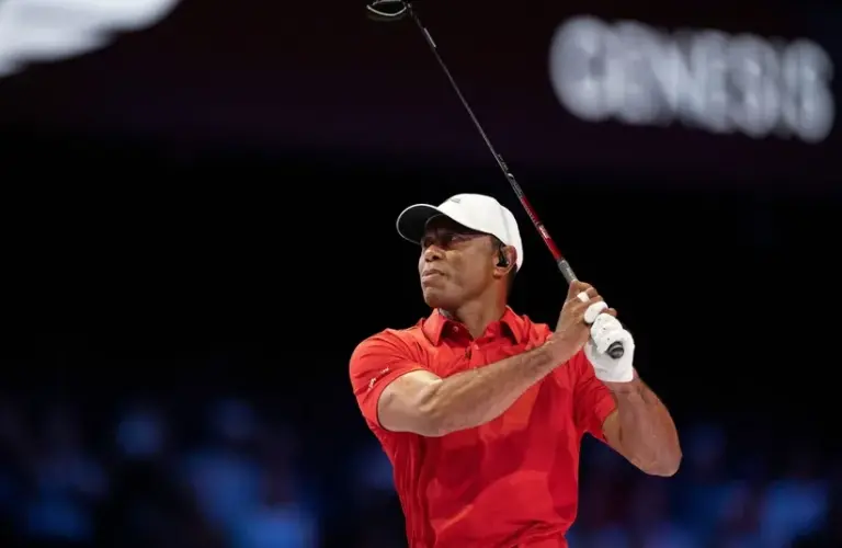 Tiger Woods of Jupiter Links GC tees off during match against Los Angeles Golf Club during the TGL finals