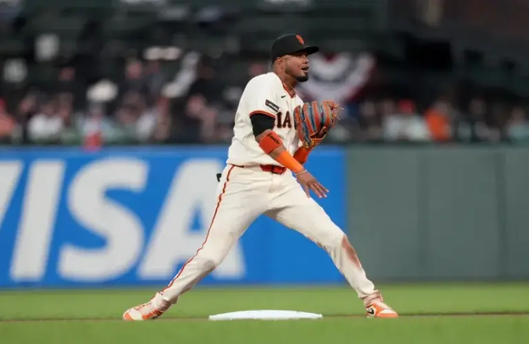 San Francisco Giants second baseman Luis Arraez (1) reacts after turning a double play