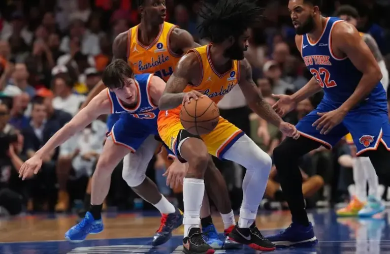 New York Knicks guard Tyler Kolek (13) tries for a steal